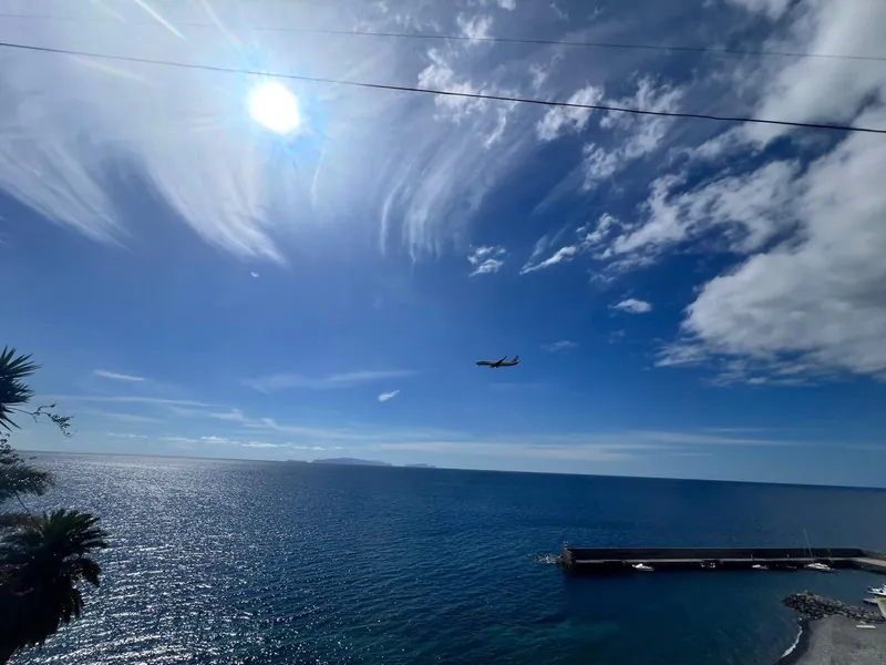 A plane coming in to land at Madeira Airport